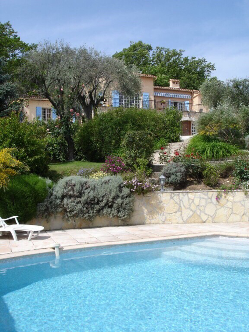View from the swimming pool looking up towards the house