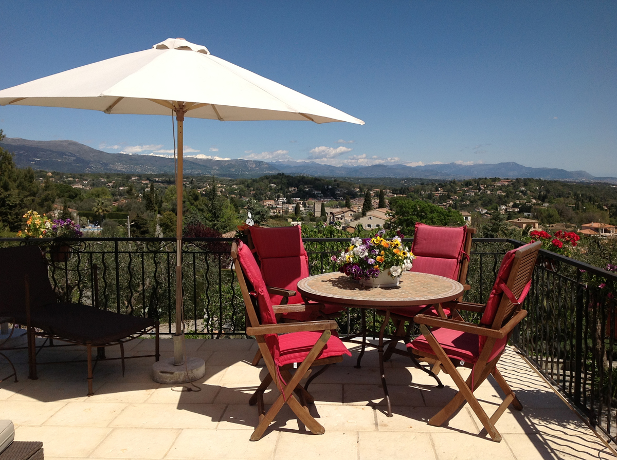 One of two eating areas on the terrace off the kitchen
